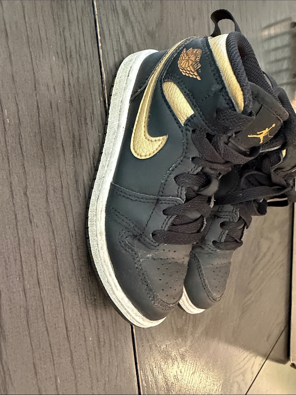 Nike Air Jordan Kids' High-Top Sneakers in Black and Gold